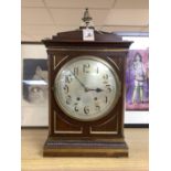 A late 19th century German mahogany and brass mounted mantel clock, 50cm high