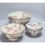 A set of six Chinese famille rose graduated bowls and a scroll picture