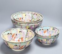 A set of six Chinese famille rose graduated bowls and a scroll picture