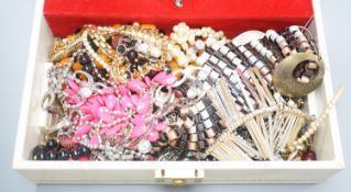 A quantity of mixed costume jewellery, including necklaces, rings etc.