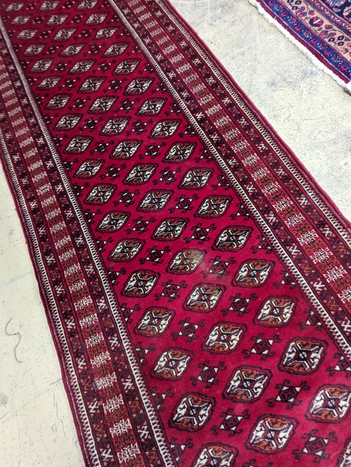 A Bokhara red ground runner, 364 x 98cm - Image 3 of 4