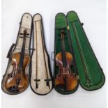 Two cased violins and bows, one with ‘Antonius Straduarius Cremonensis Faciebat Anno 17/13 Made In
