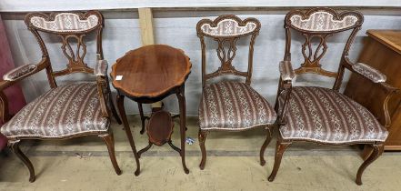 Three late Victorian bone inlaid mahogany chairs, two with arms, together with an Edwardian oval