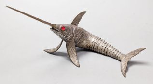 A 20th century Spanish articulated model of a swordfish, with red glass eyes, approx. 26.5cm,