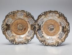 A pair of silver plated wine coasters 20cm