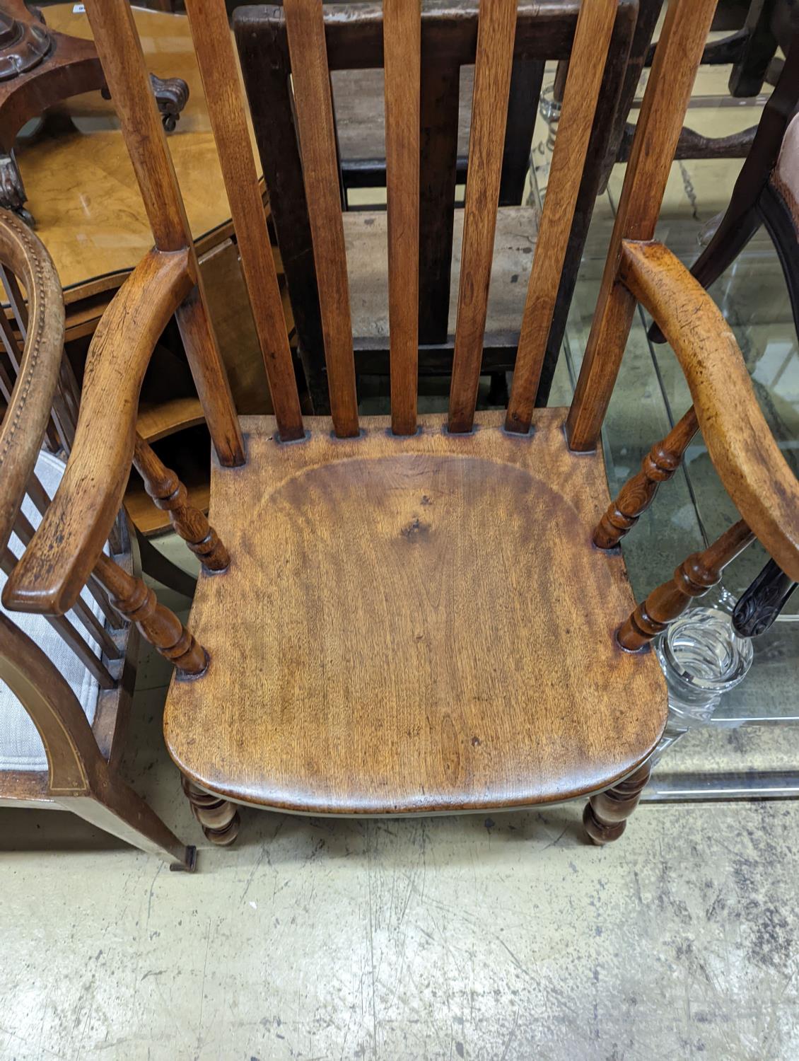 A Victorian elm and beech Windsor lathe back armchair, width 57cm, depth 45cm, height 118cm - Image 3 of 3