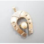 A yellow and white metal and cultured pearl set horseshoe pendant, 27mm, gross weight 4.1 grams.
