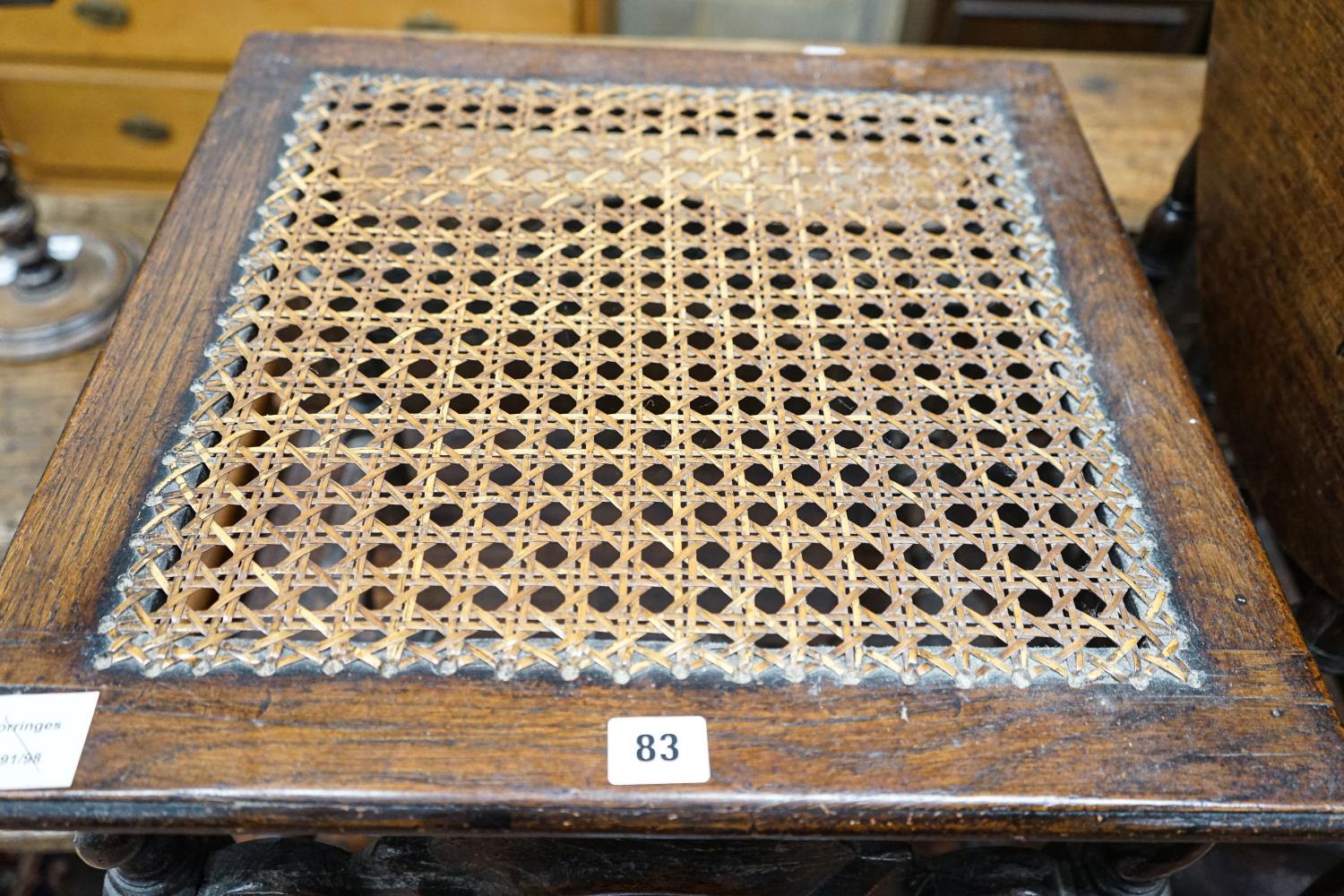 A 17th century style carved oak stool, with caned seat and H stretcher, width 47cm, depth 46cm, - Image 3 of 3