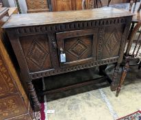 An 18th century style carved oak side cabinet, width 90cm, depth 35cm, height 83cm