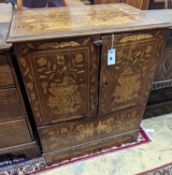 An 18th century Dutch floral marquetry walnut cabinet (altered), width 70cm, depth 48cm, height