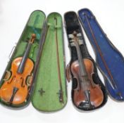 A 19th century 3/4 size violin, cased with 2 bows and 1 other German violin