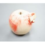 A Japanese carved ivory model of a partially peeled apple, c.1900, 5cm