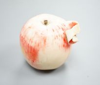 A Japanese carved ivory model of a partially peeled apple, c.1900, 5cm