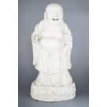 A Chinese blanc-de-chine figure of Budai, 19cm