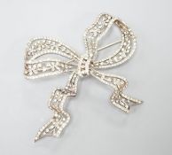 A sterling and paste set large ribbon bow brooch, width 95mm.