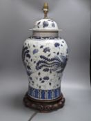 A Chinese blue enamelled porcelain baluster vase, converted to electric lamp 52cm