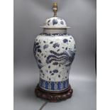 A Chinese blue enamelled porcelain baluster vase, converted to electric lamp 52cm