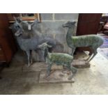 Three lead garden statues modelled as deer, largest height 105cm