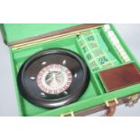 An Asprey tan leather cased games box