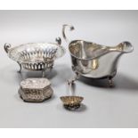 A George V silver sauceboat by Mappin & Webb, Birmingham, 1911, an Edwardian silver tri-handled