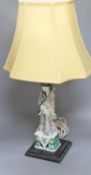 A Chinese famille verte figure of an immortal, mounted as a table lamp, height to fitting 49cm