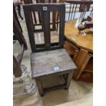 Two antique oak backstools