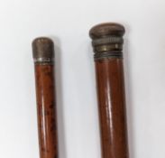 A 19th century novelty ‘pen and pencil’ walking stick together with a glass toddy walking stick