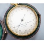 A Negretti and Zambra gilt metal cased pocket barometer