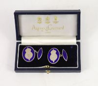 A pair of Asprey and Garrard silver and blue enamel ‘’Prince of Wales’’ presentation cufflinks,