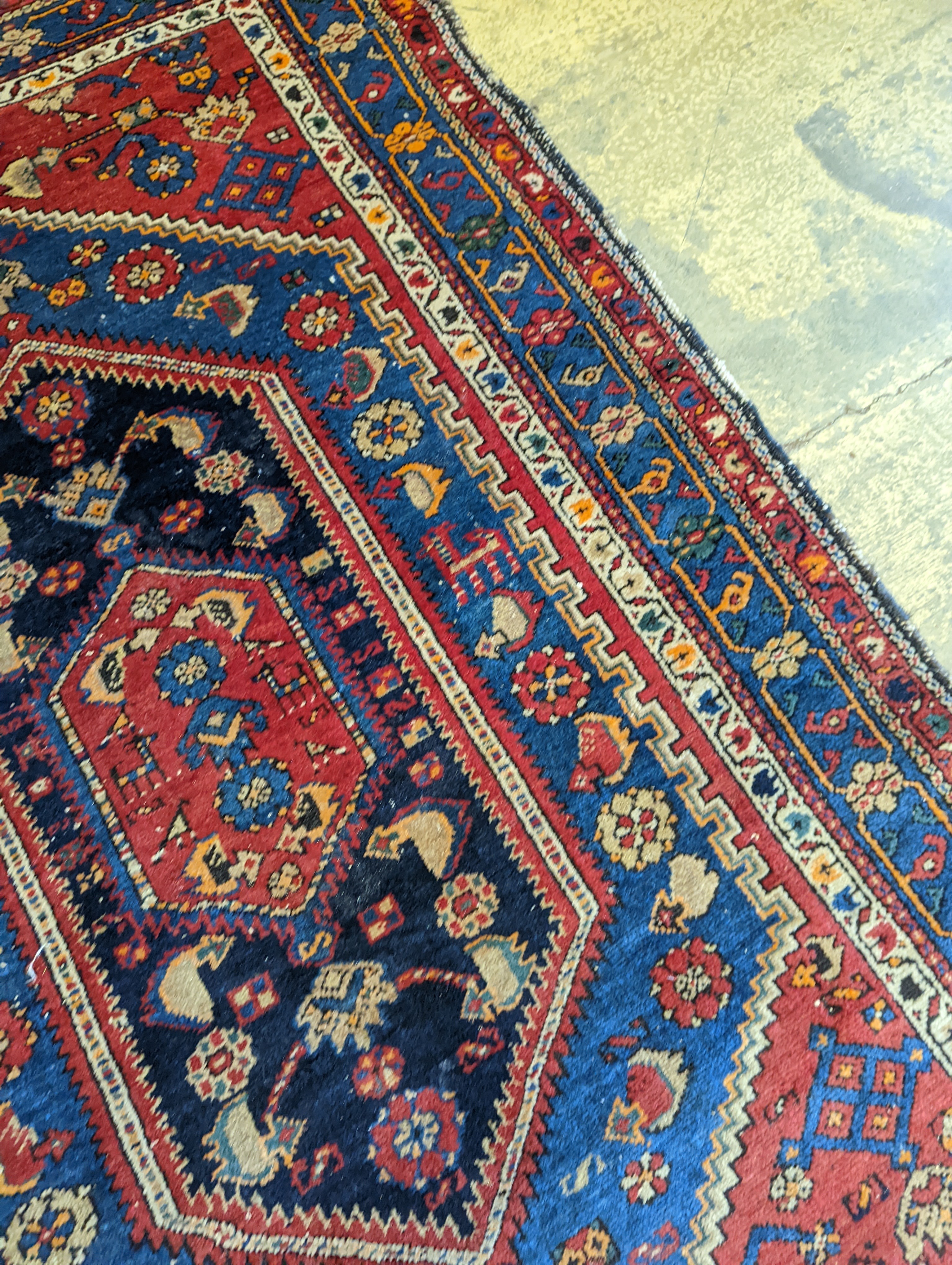 A Caucasian brick red ground rug, 194 x 130cm - Image 5 of 13