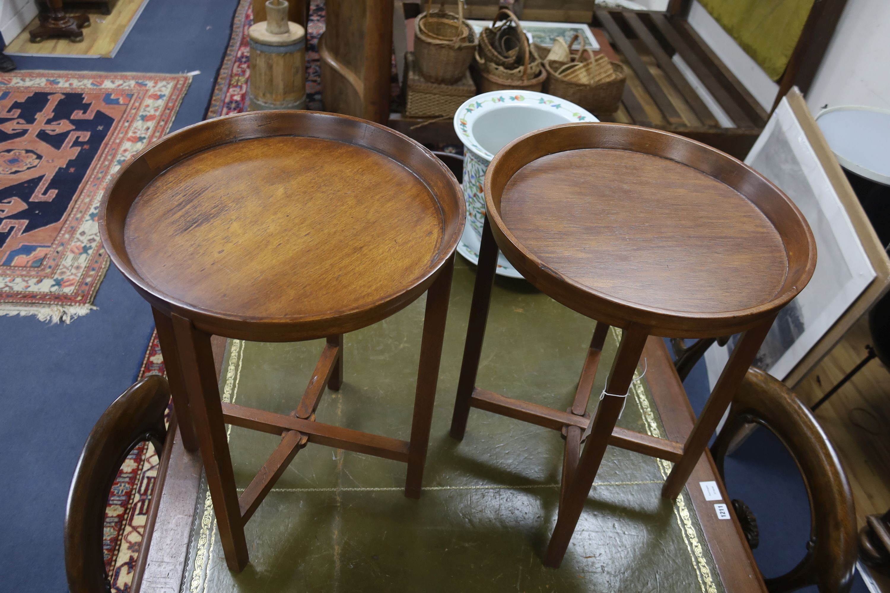 A pair of circular mahogany folding tray top occasional tables, diameter 46cm, height 60cm - Image 2 of 2
