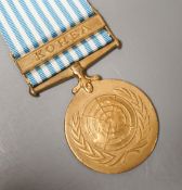 Four military medals - Korea medal to A. J. de Courcy Harrison, UN Korea medal, a George VI Cadet