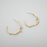 A pair of 18ct gold and three stone diamond set rustic hoop earrings, no butterflies, 25mm, gross