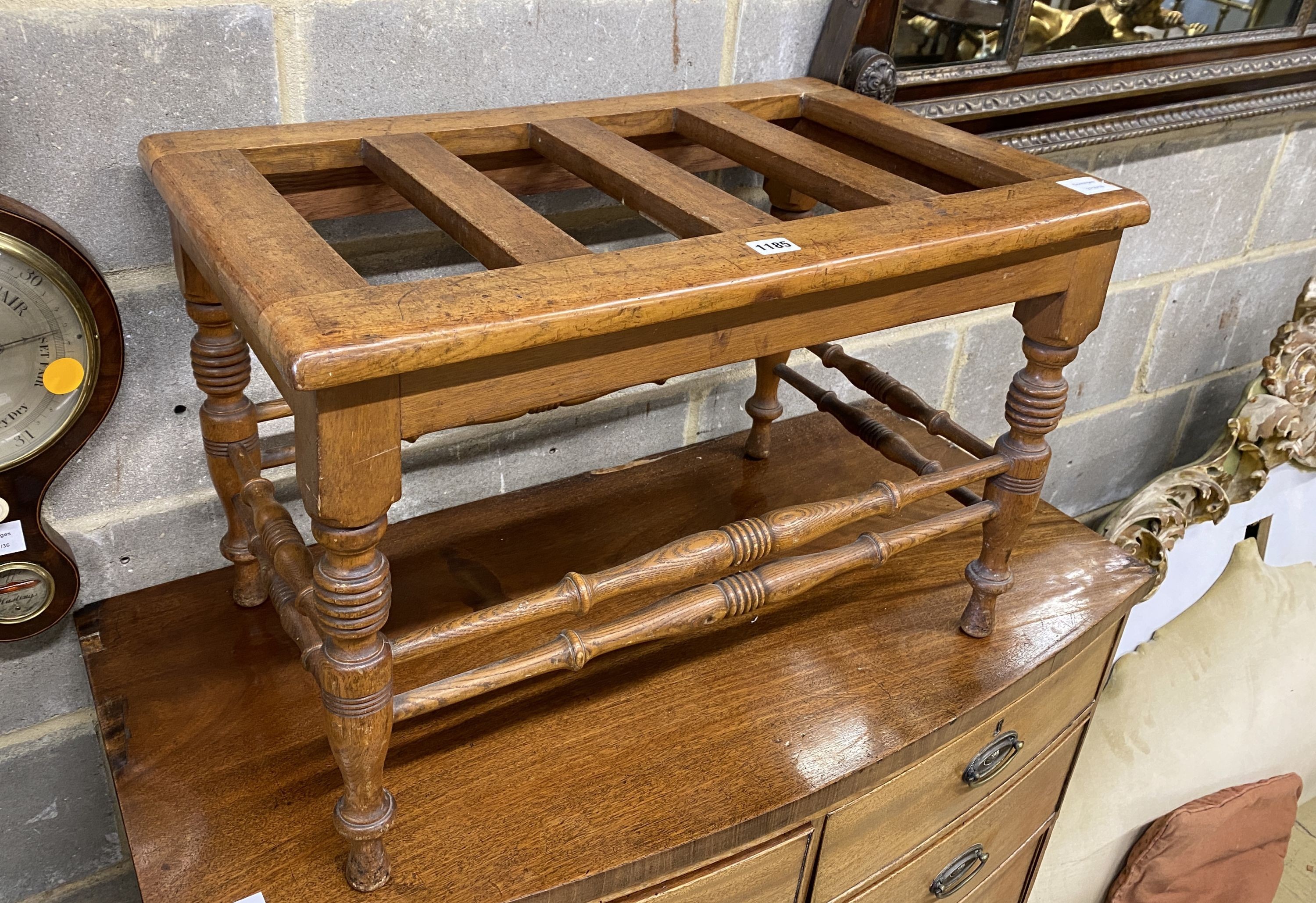 A Victorian oak luggage stand, width 69cm, depth 43cm, height 46cm