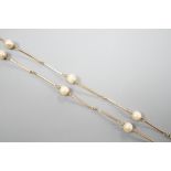 A yellow metal and cultured pearl set necklet, 70cm, gross weight 11.5 grams.