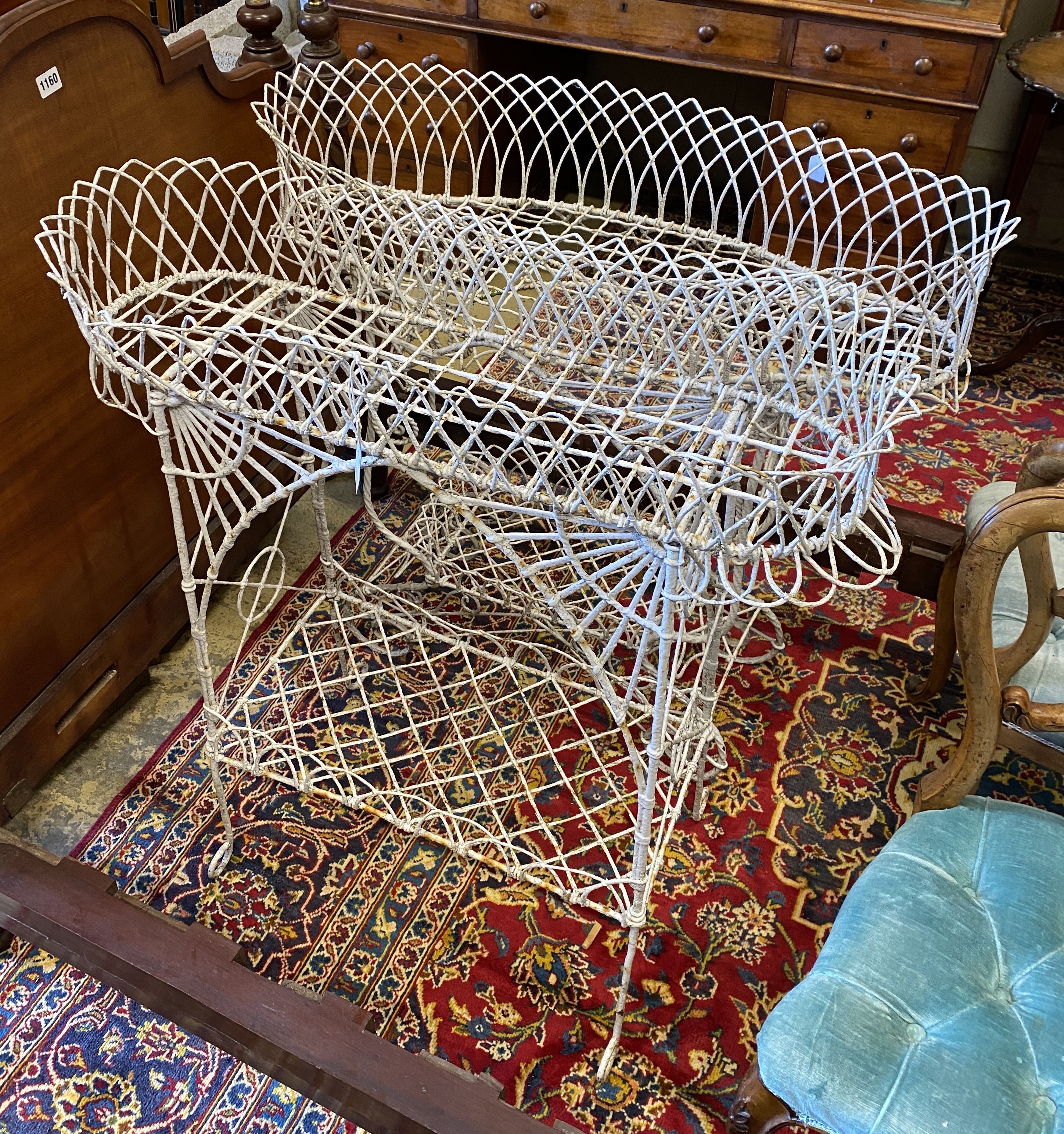 Two Victorian two tier wirework pot stands, larger width 84cm, height 94cm