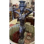 A patinated bronze African female planter, height 183cm