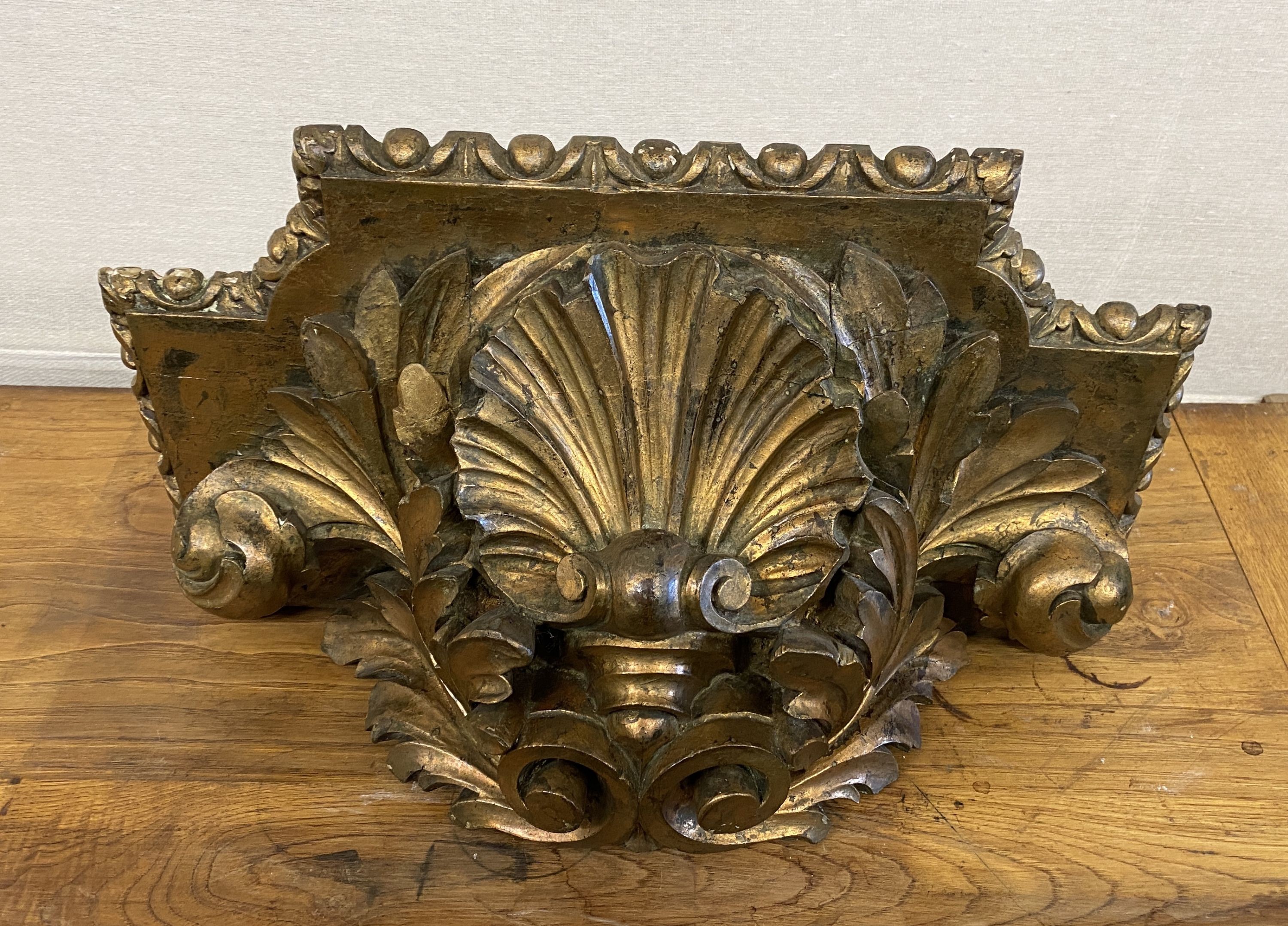 A 19th century carved giltwood wall hanging bracket, width 56cm, depth 33cm