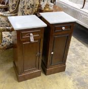 A near pair of late 19th century French marble topped bedside cabinets, width 35cm, depth 35cm,