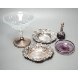 Two pierced silver trinket dishes, a late Victorian silver mounted amethyst glass dish, a similar