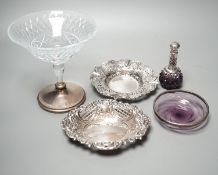 Two pierced silver trinket dishes, a late Victorian silver mounted amethyst glass dish, a similar