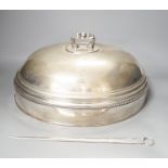 A silver plated cloche / meat cover and a plated meat skewer