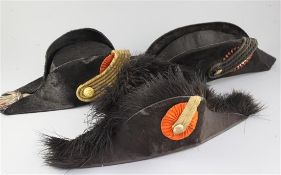 Three 19th century officer's bicorn hats,one by J.P. Hol of Braeda,