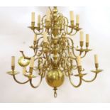 A 19th century Dutch brass chandelier, 84 cm high