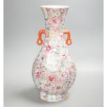 A Chinese famille rose millefleur 2 handled vase, 36cms high.