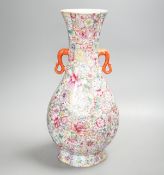 A Chinese famille rose millefleur 2 handled vase, 36cms high.