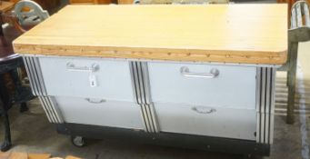 A mid 20th century shop counter cabinet with pine strip work top, width 152cm depth 71cm height