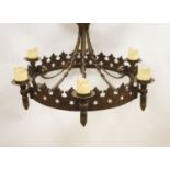 A 19th century wrought iron chandelier, approximately 83 cm across