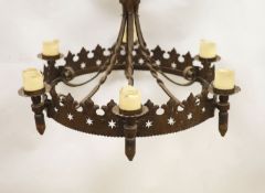 A 19th century wrought iron chandelier, approximately 83 cm across