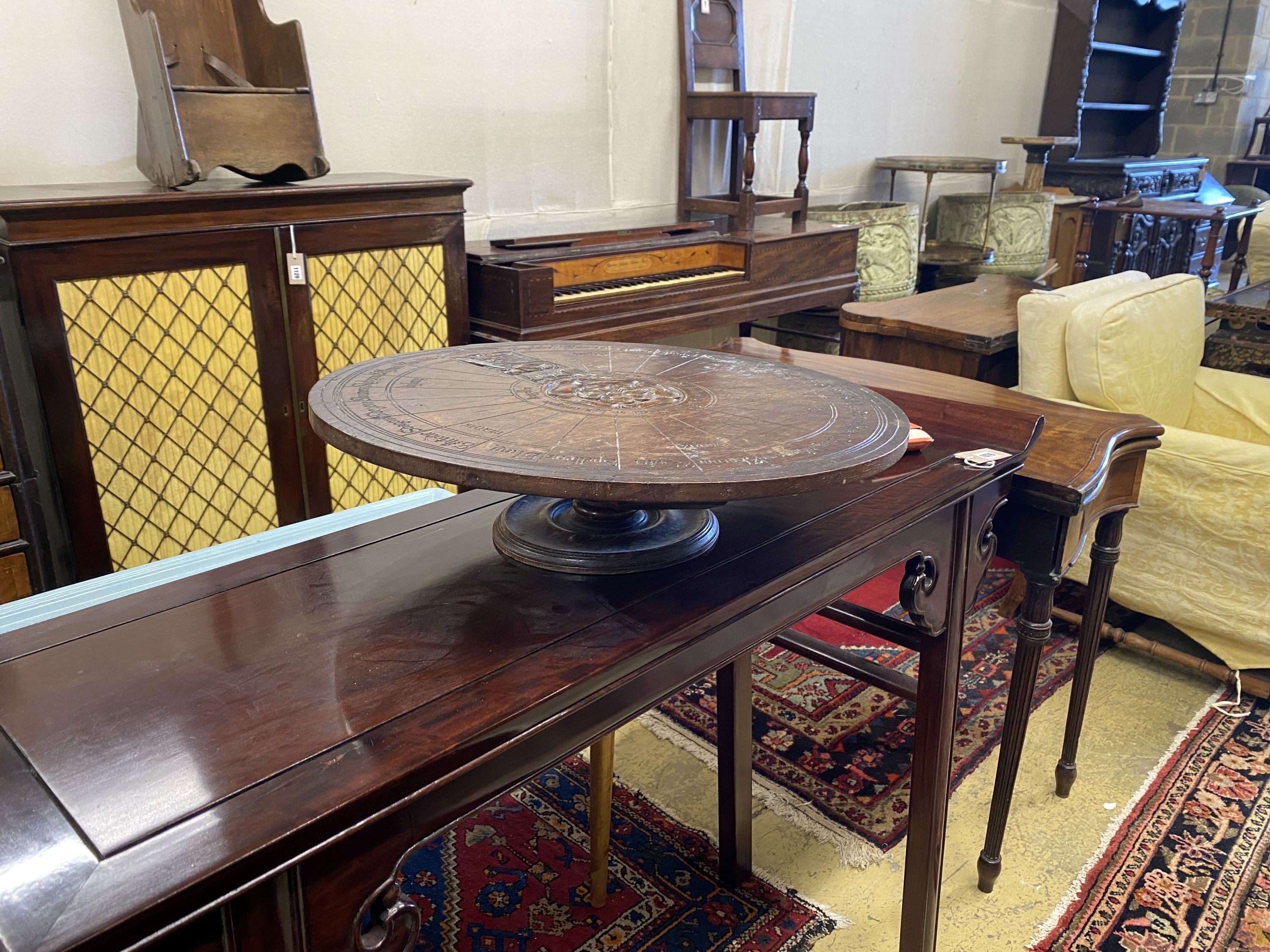 An early 20th century carved oak lazy Susan modelled on King Arthur’s round table, diameter 55cm, - Image 2 of 2